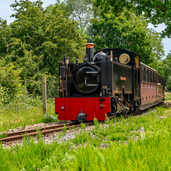 No. 8 John of Gaunt locomotive travelling through the countryside