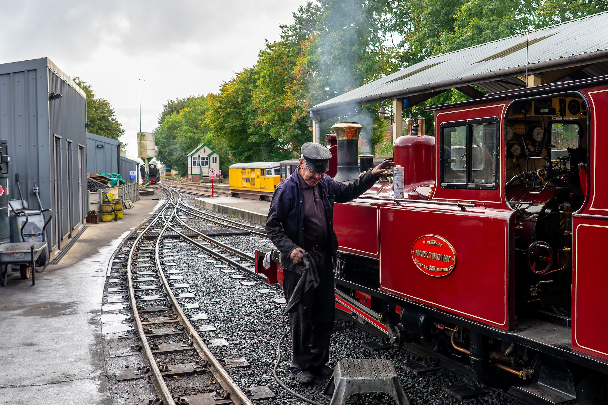 Volunteer Maintaining The Mark Timothy Locomotive