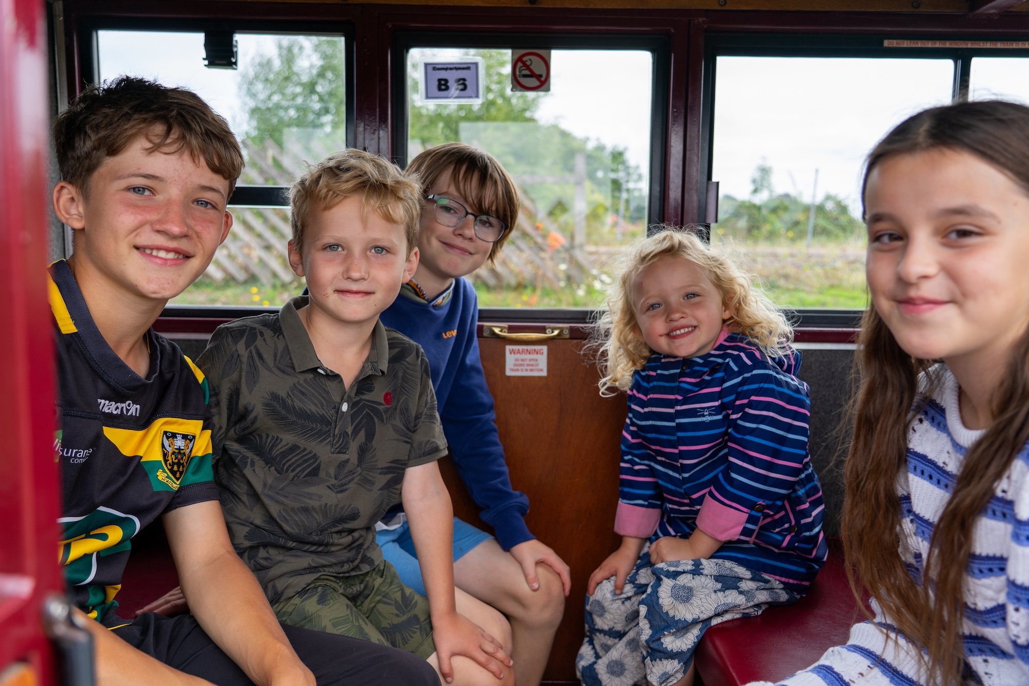 Group Of Children In A Carriage