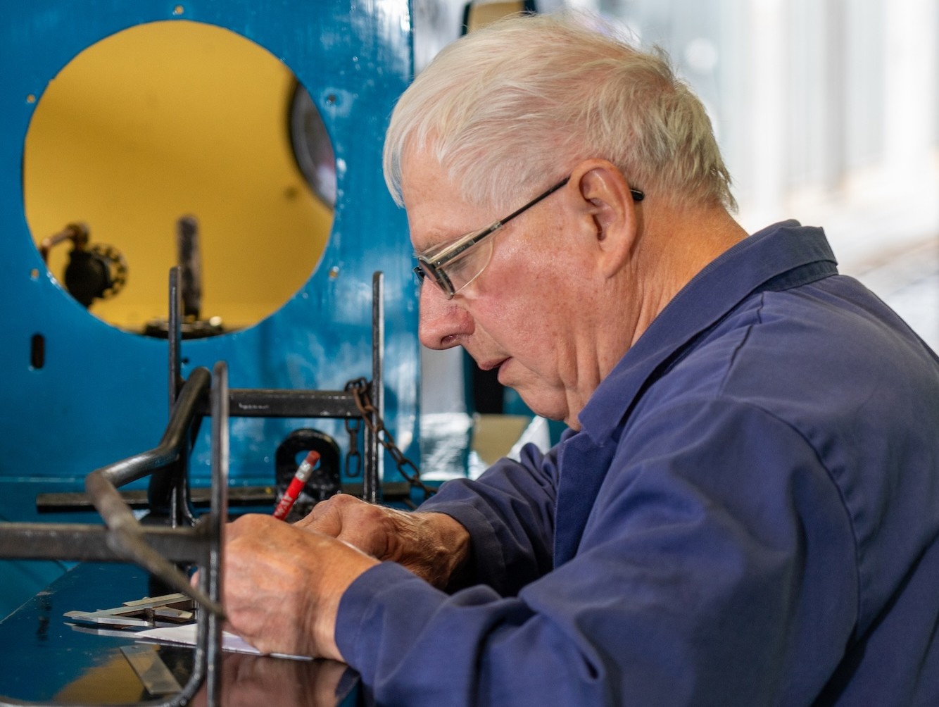 Volunteer Keith Completing Maintenance Records
