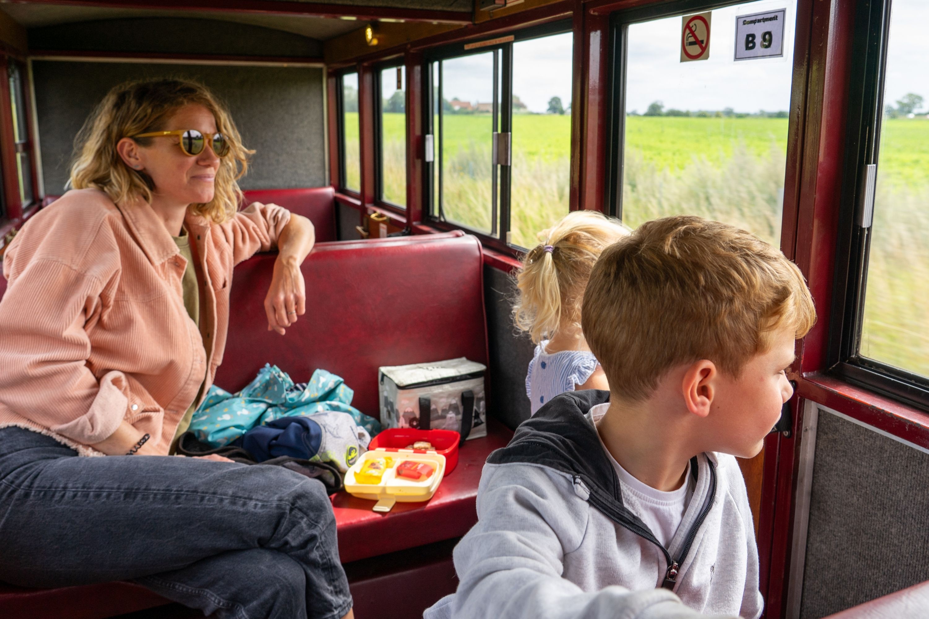Mum With Daughter And Son Travelling The Bure Valley Railway