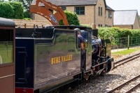 Steam Locomotive And Heritage Train Carriages Departing Coltishall