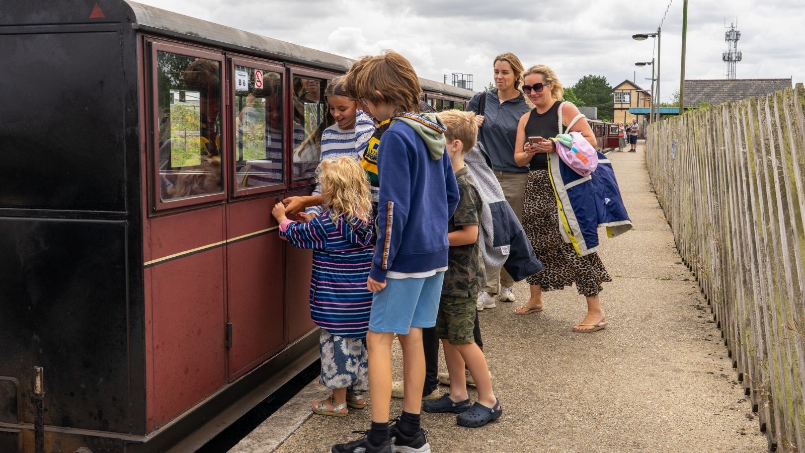 Children Waiting To Board The Train