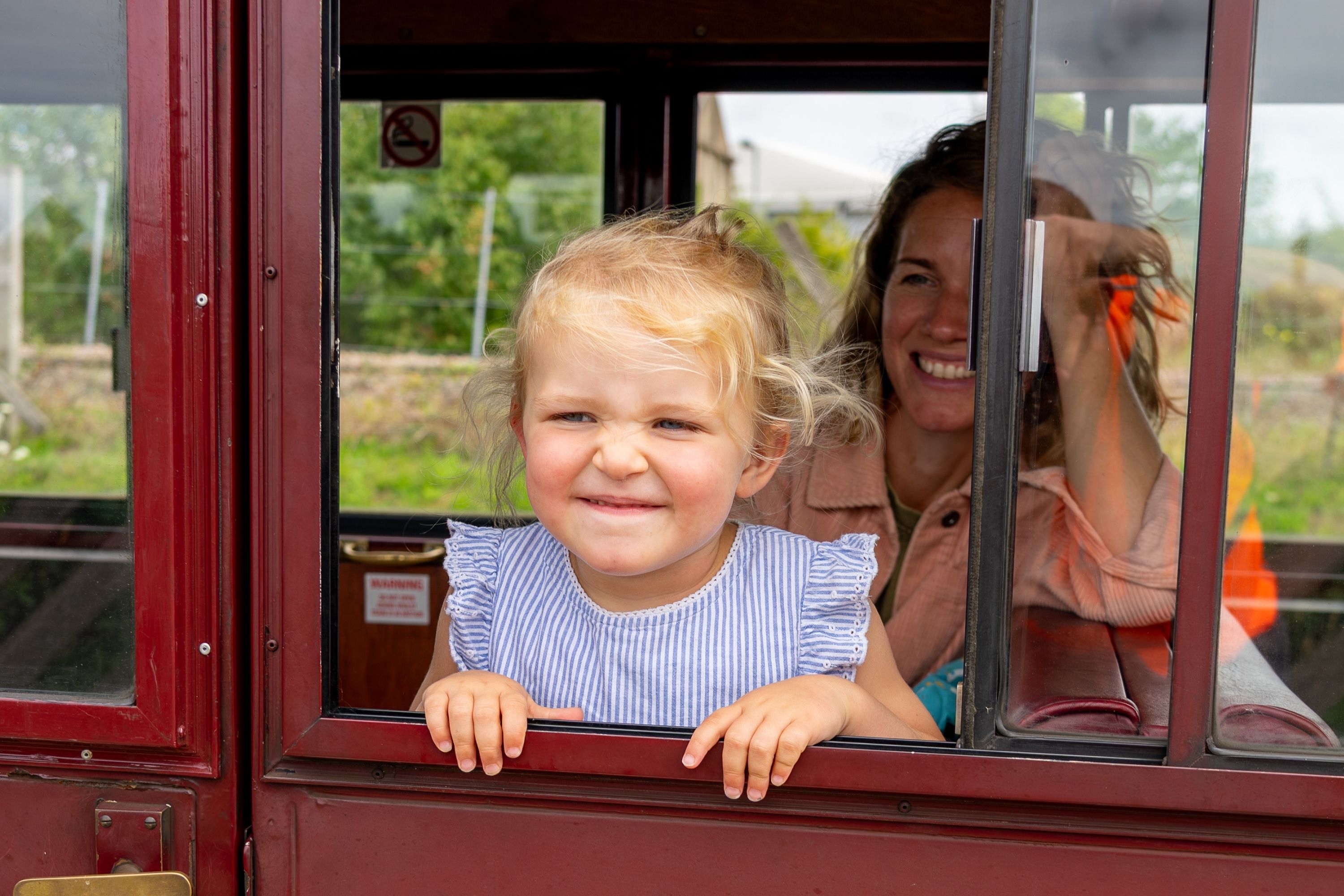 Mum And Daughter Ready To Depart The Station