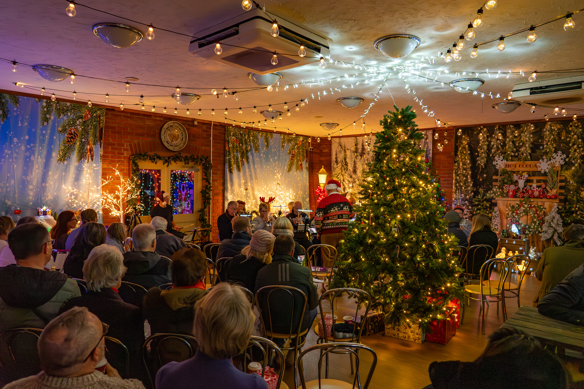 Passengers Enjoying Christmas Music before the Noel Night Train