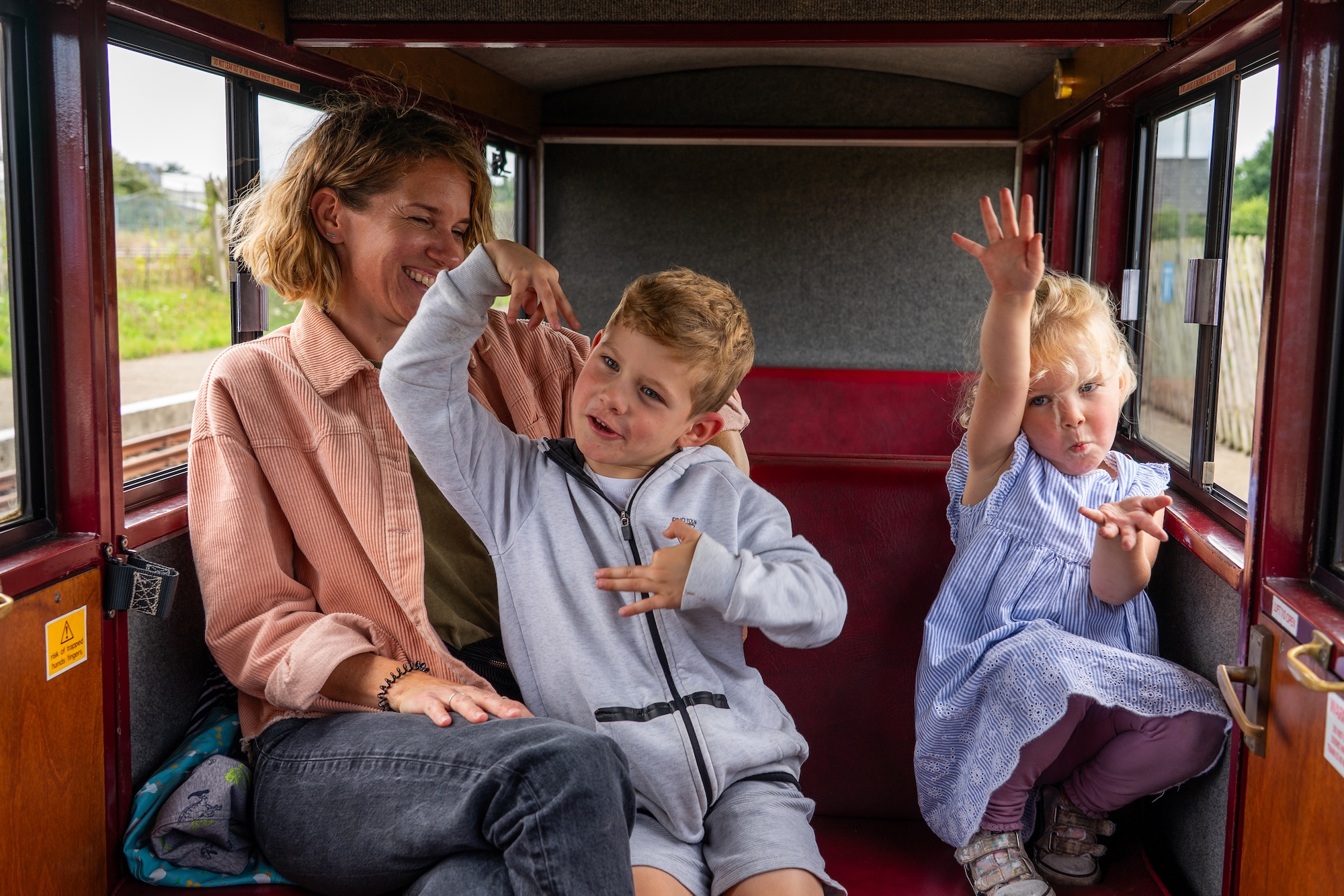 Mum With Son And Daughter In A Carriage