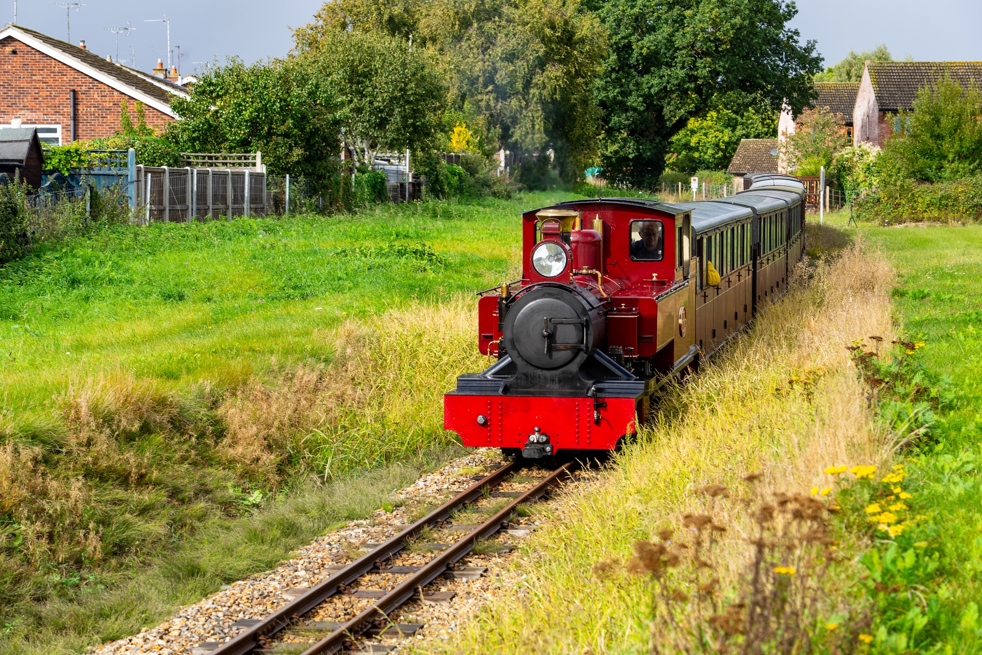 No. 9 Mark Timothy Hauling A Passenger Train Through The Norfolk Countryside
