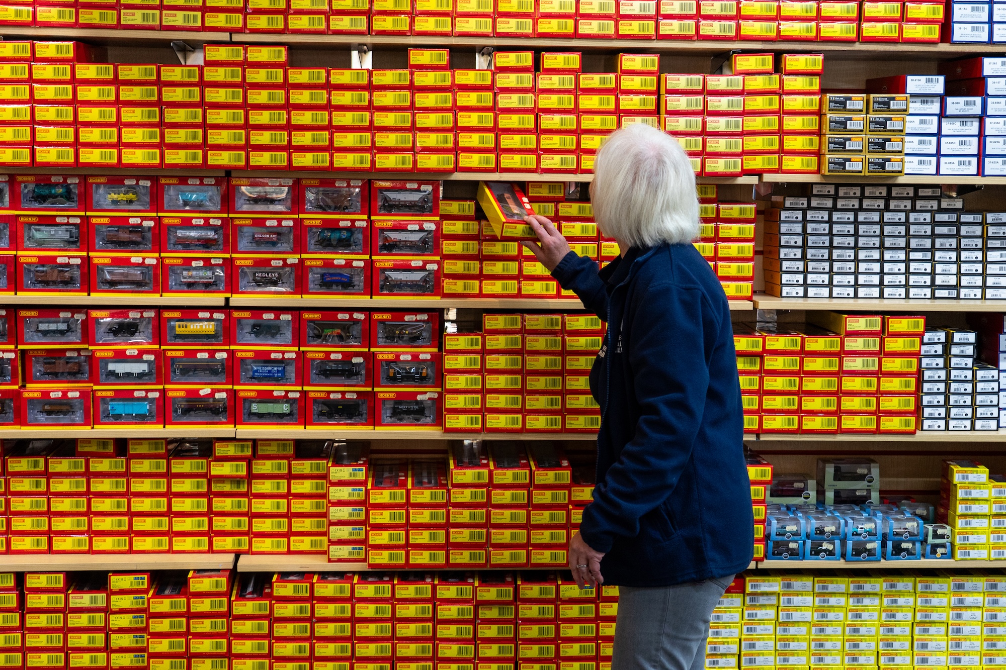 Shelves Filled With Boxed Hornby Model Railway Stock And Accessories